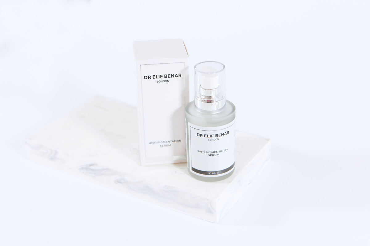 Dr Elif Benar Anti Pigmentation Serum 30ml bottle and box on a white marble block