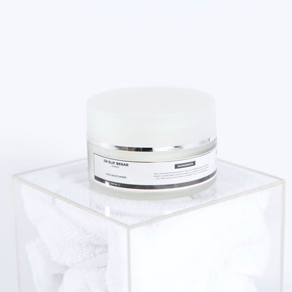 Dr Elif Benar Face Moisturiser jar on a clear acrylic cube, hydrating cream for dry and sensitive skin