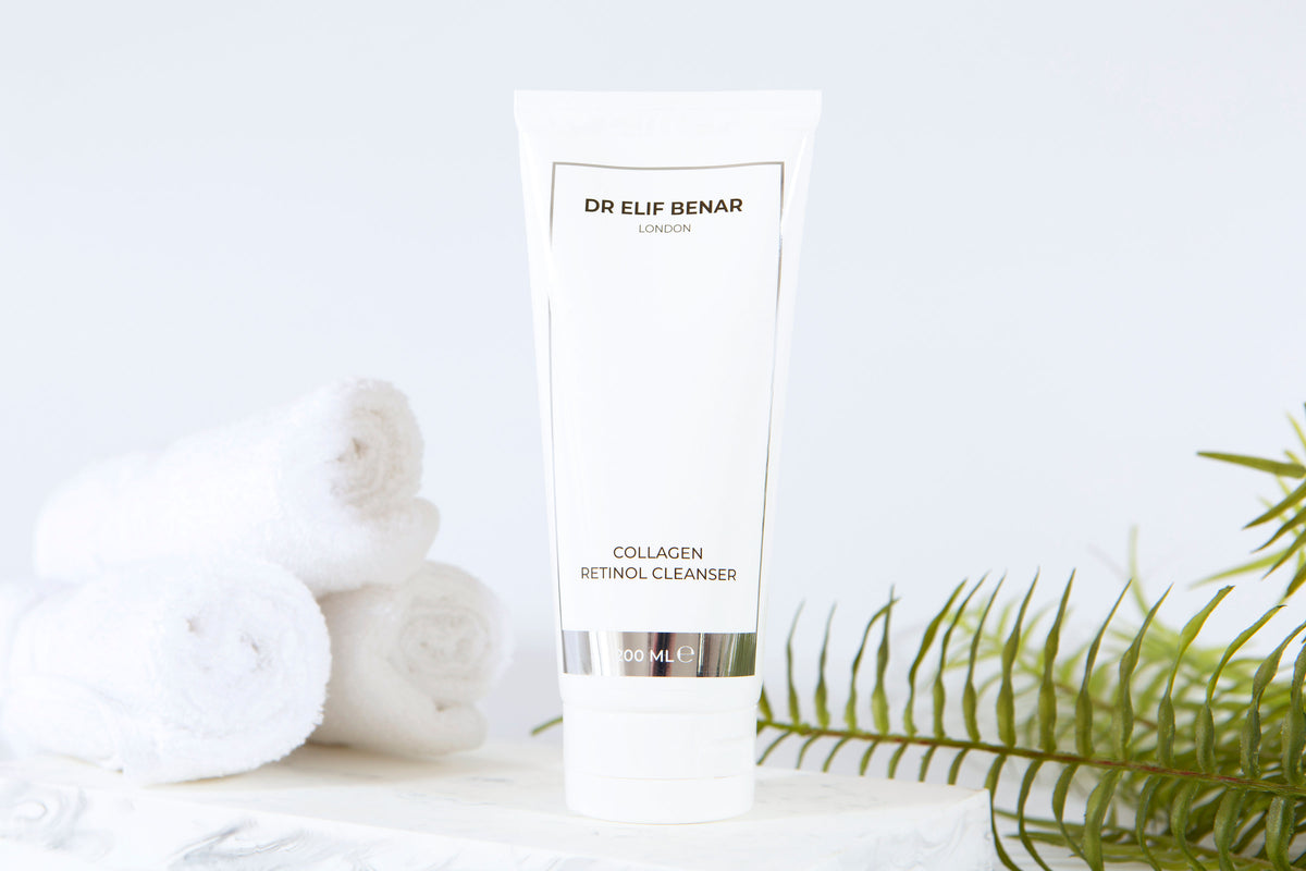 Dr Elif Benar Collagen Retinol Cleanser 200ml with rolled white towels and green fern